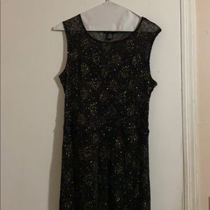 Woman gold and black dress